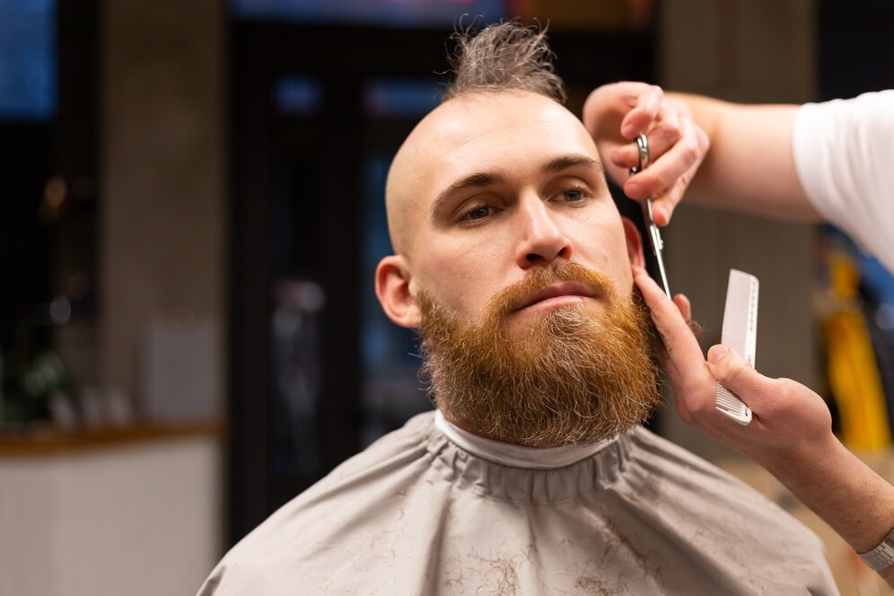 Sharp fade with a clean, fresh look that suits his bold personality.