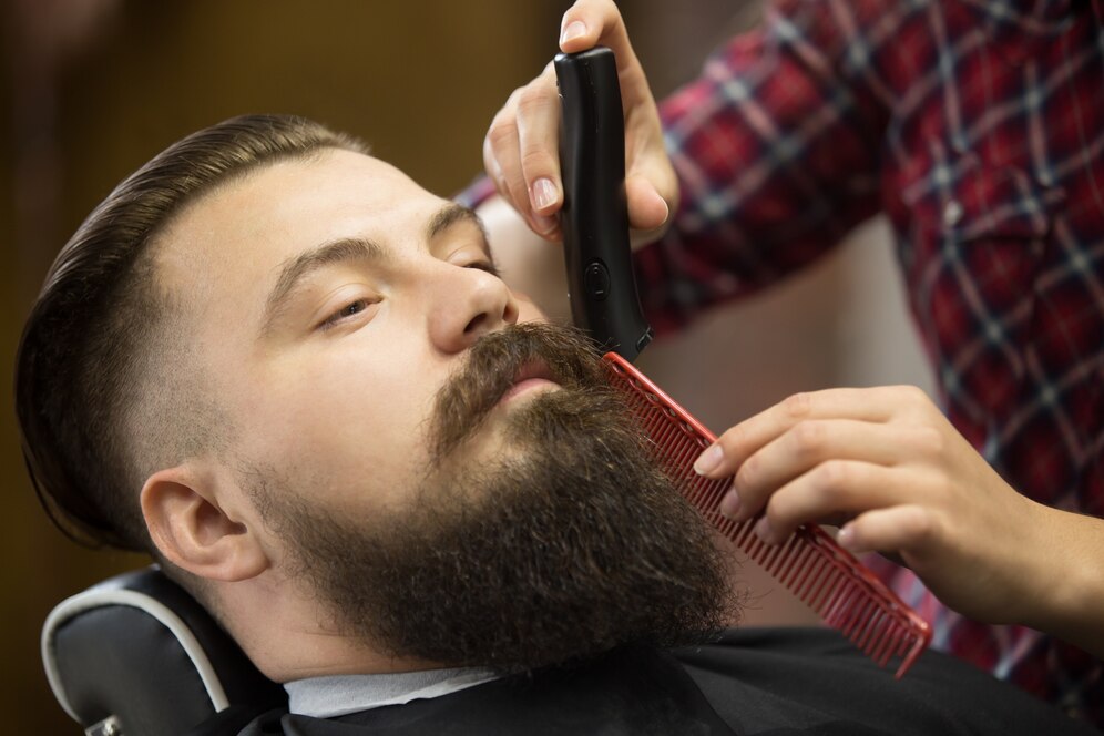 Combining a perfect fade with a stylish beard for the ultimate sharp appearance.